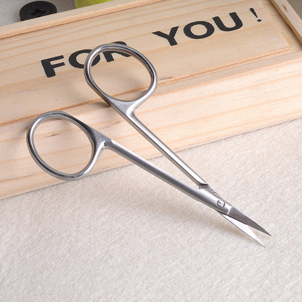How to trim eyelashes with scissors