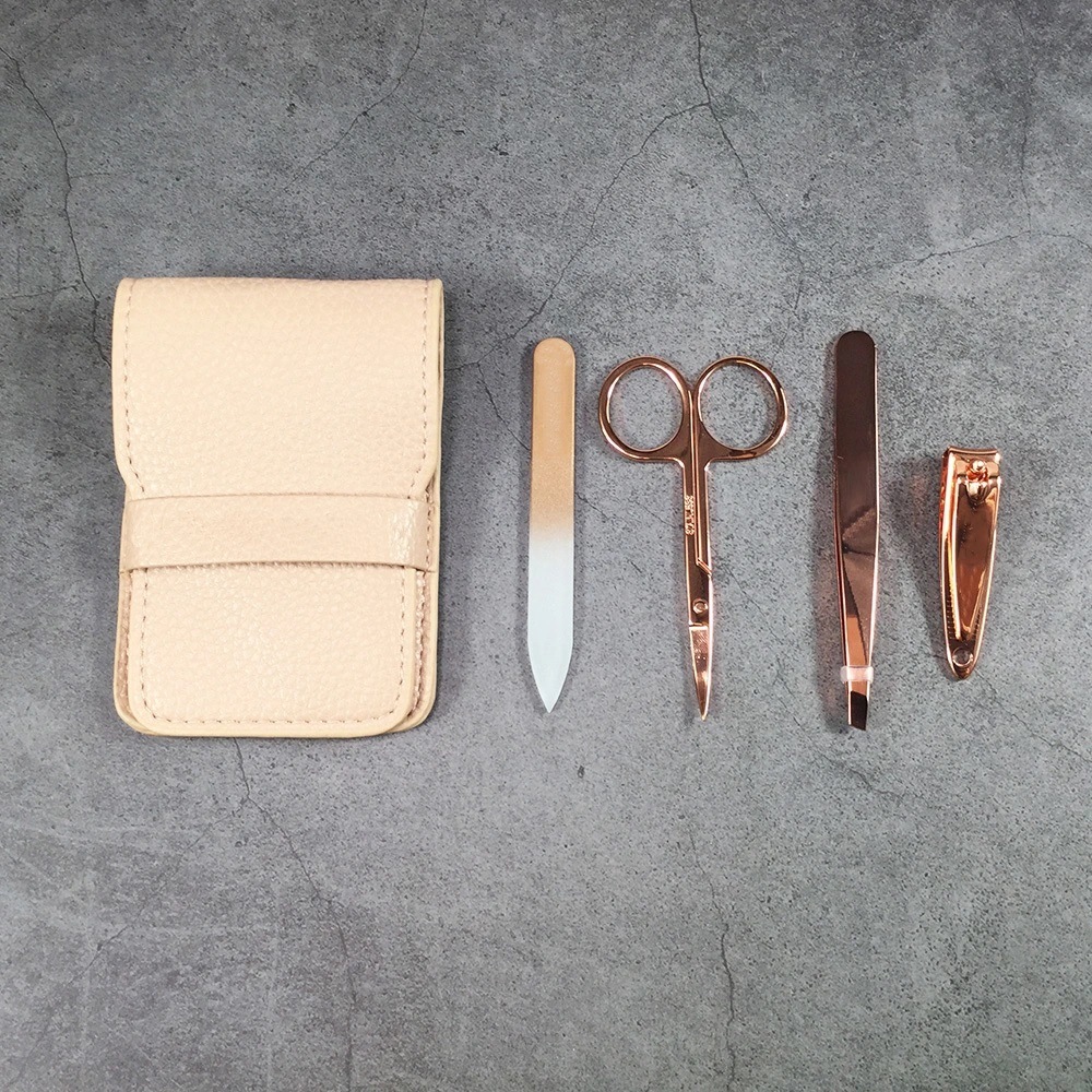 Golden Metal 4-Piece Manicure Kit with Nude PU Pouch Packaging